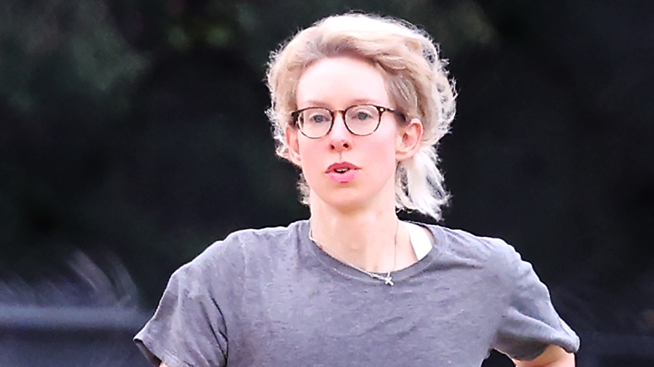 Theranos founder Elizabeth Holmes seen jogging and carrying weights at federal prison in Texas