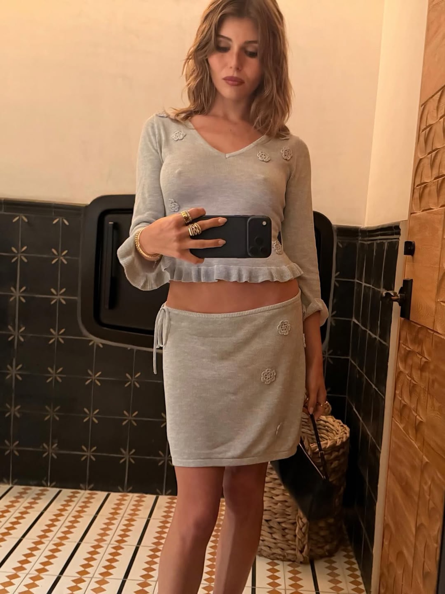 Olivia Jade Rocks a String Black Bikini and Goes Braless Underneath Knit Top