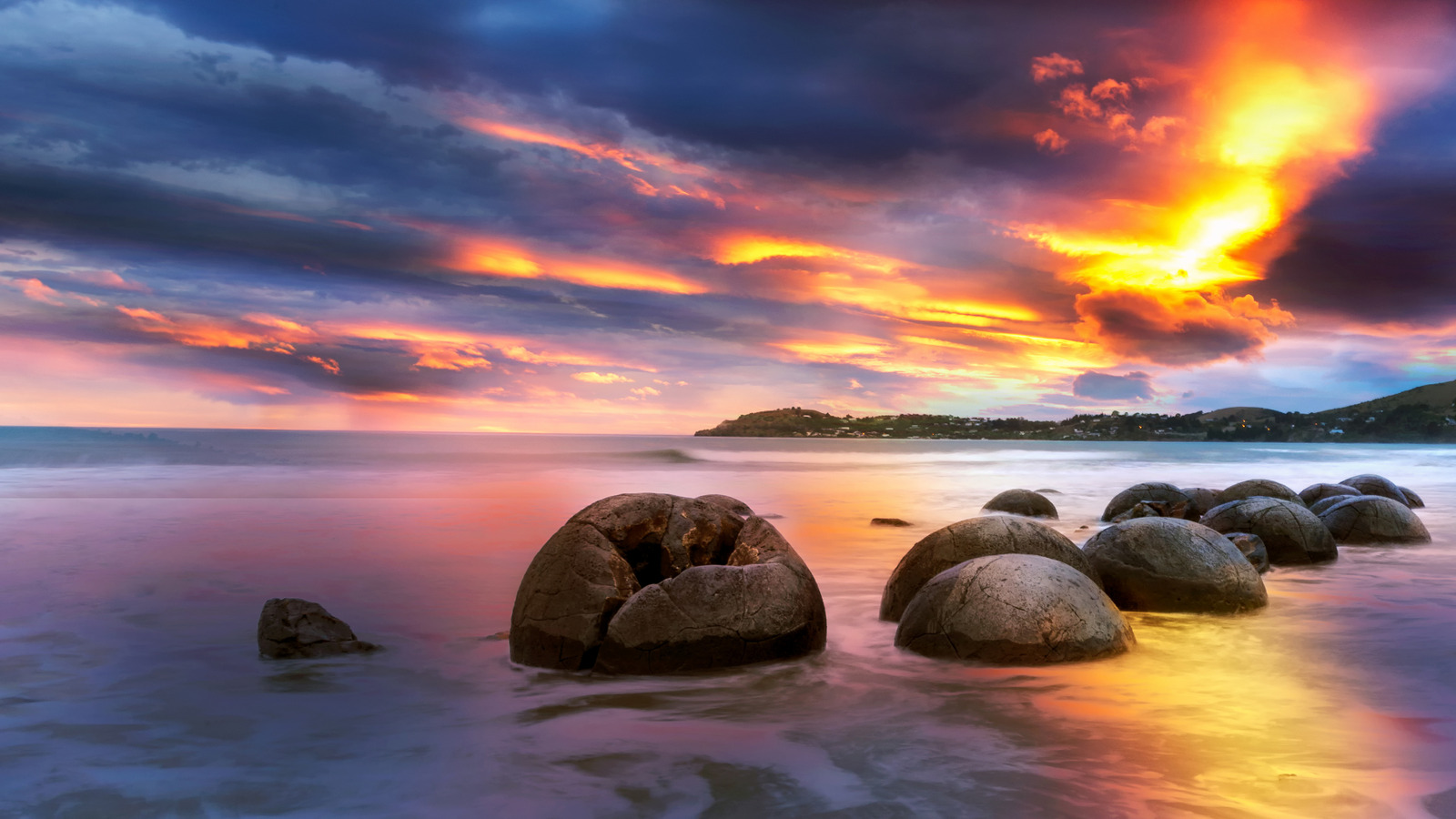 This New Zealand Beach Is Known For Its Mysterious Spherical Boulders And Spectacular Ocean Sunsets