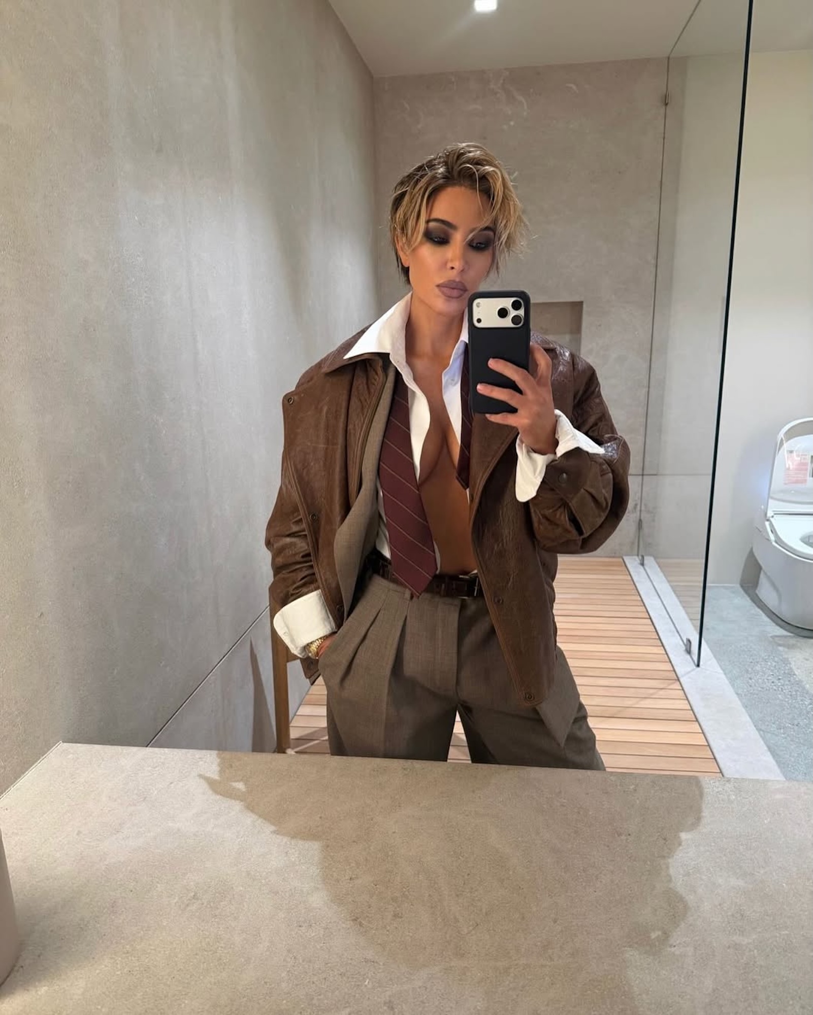 Kim Kardashian Shares BTS Pics From Her Sultry Nude Painted Photo Shoot