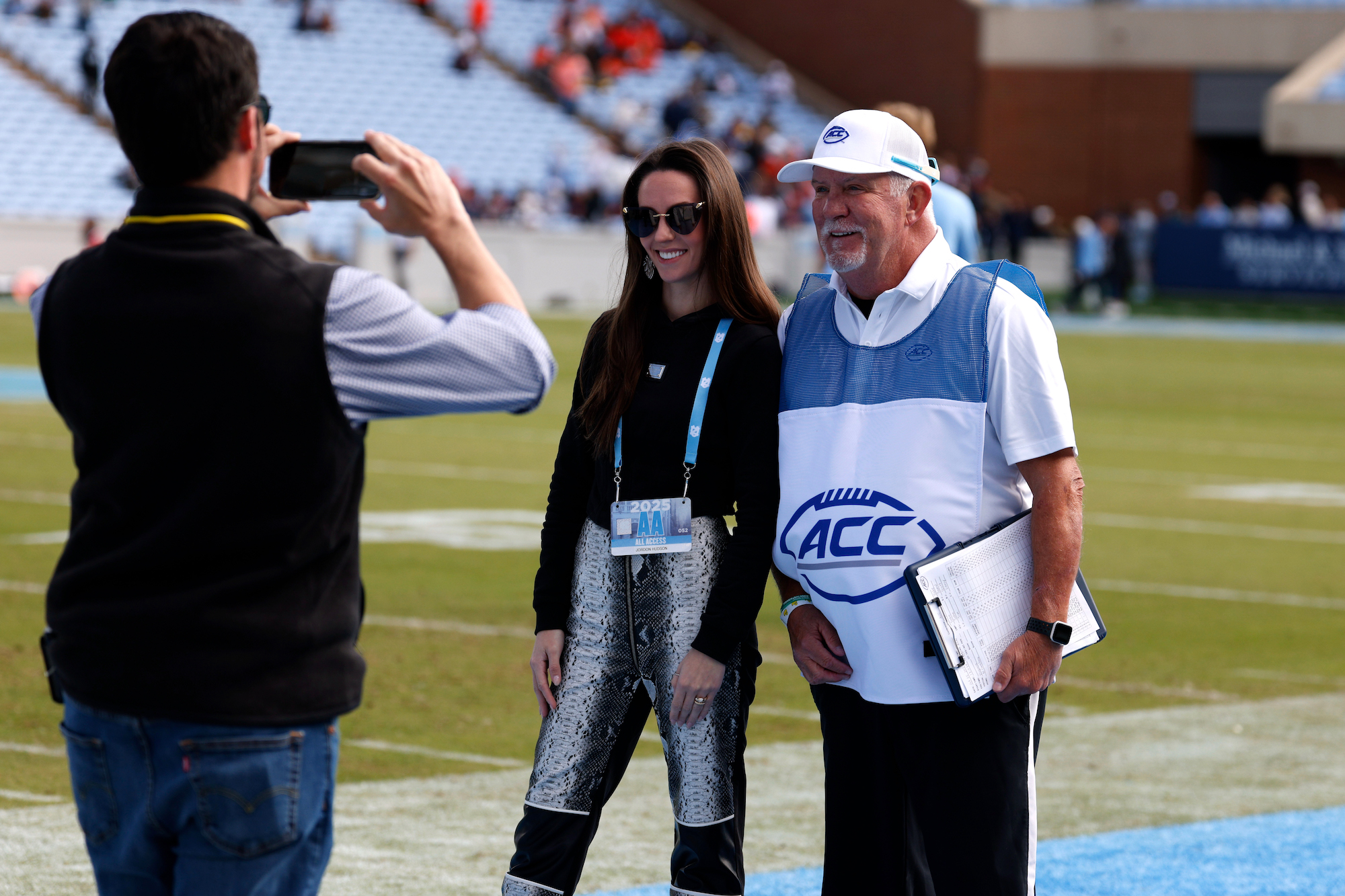 Jordon Hudson Brings the Drama With Snakeskin Pants to Bill Belichick's Game