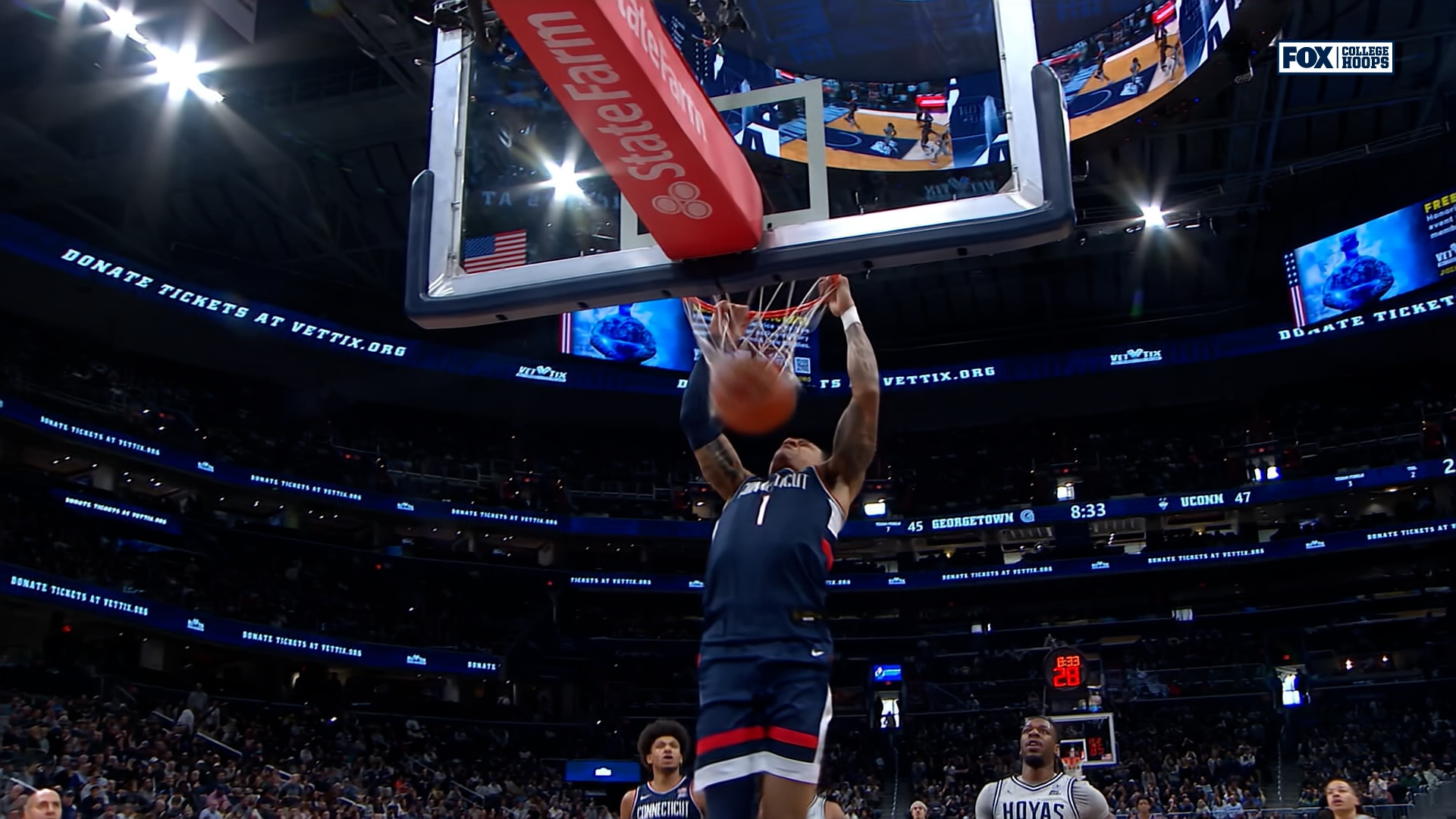 Solo Ball forces turnover and throws down slam dunk, extending UConn's lead against Georgetown