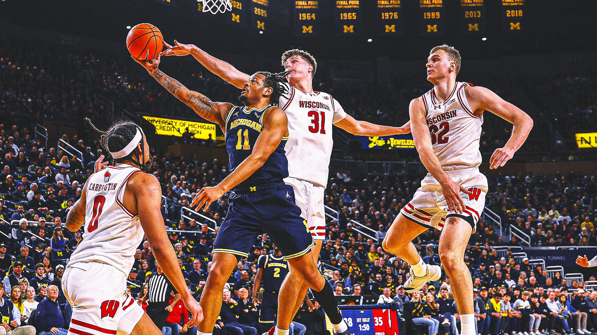 No. 2 Michigan HC Dusty May 'Disappointed' After Stunning 1st Loss vs. Wisconsin