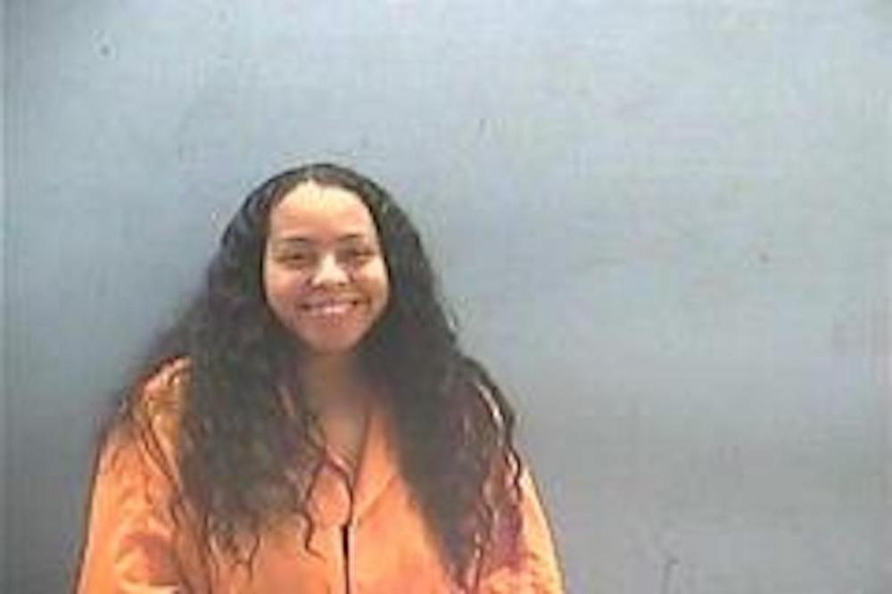 Woman Smiles in Mugshot After Beating Pregnant Mother of 2 With Baseball Bat