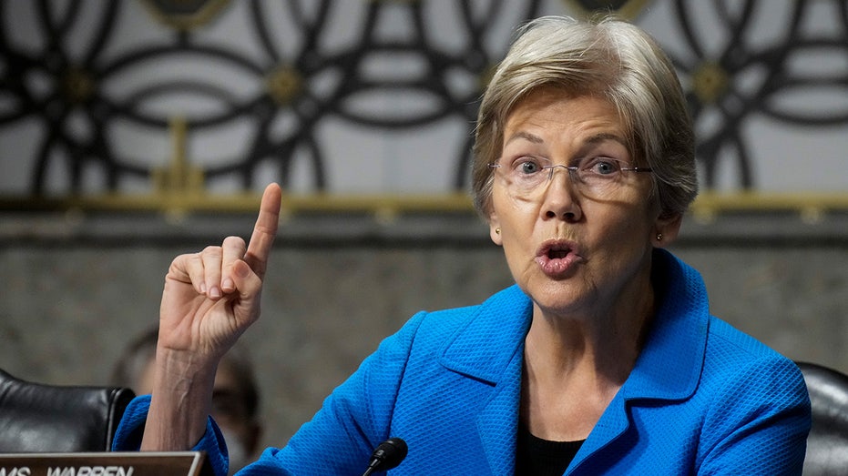 Warren launches probe into major banks over Trump Venezuela oil sales