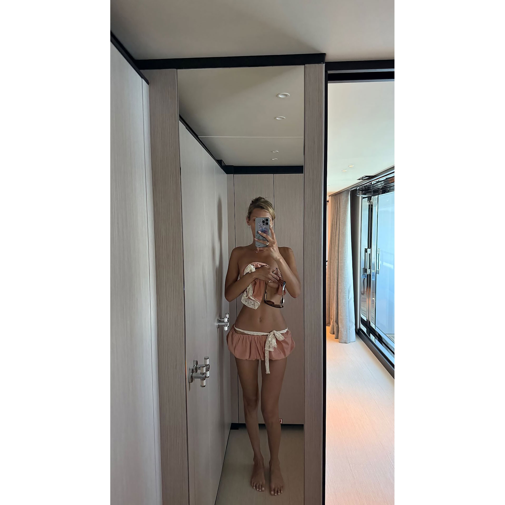 Bella Hadid Goes Topless While Showing Off Her Tan in Itty-Bitty Bottoms