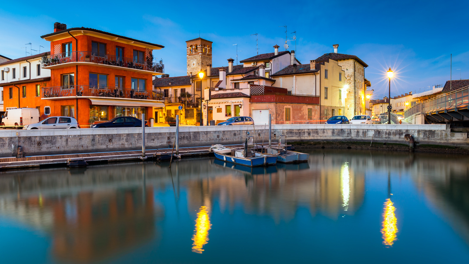 Situated Between Venice And Trieste Is Italy's Coastal Commune, Surrounded By Salt Marshes And Stone Churches