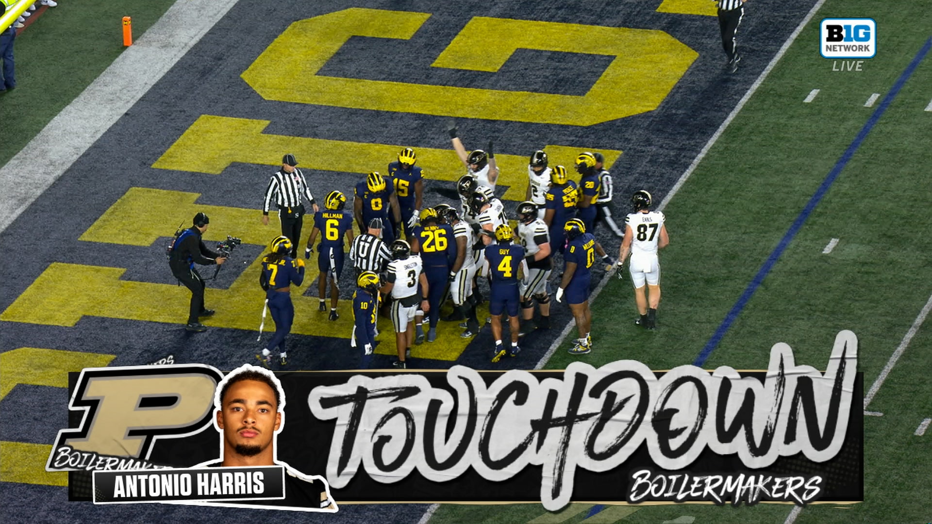 Antonio Harris rushes 2 yards for a touchdown, pulling Purdue even with Michigan