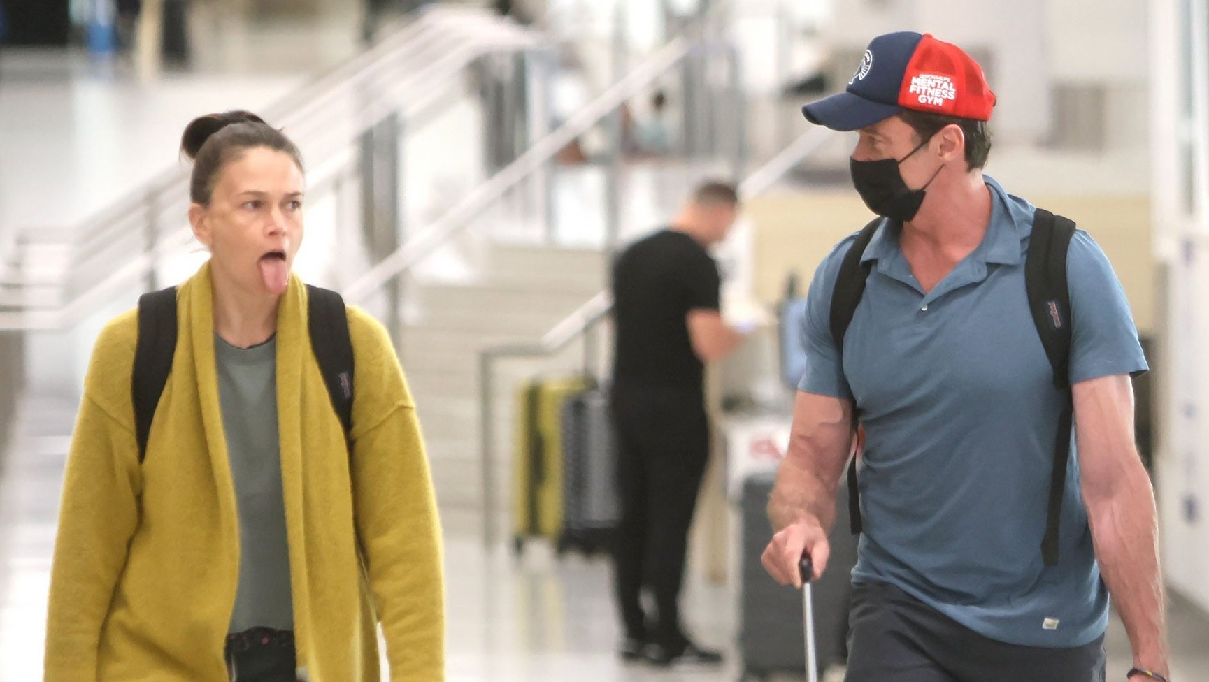 Hugh Jackman and Sutton Foster Keep It Flirty and Fun During Airport Outing