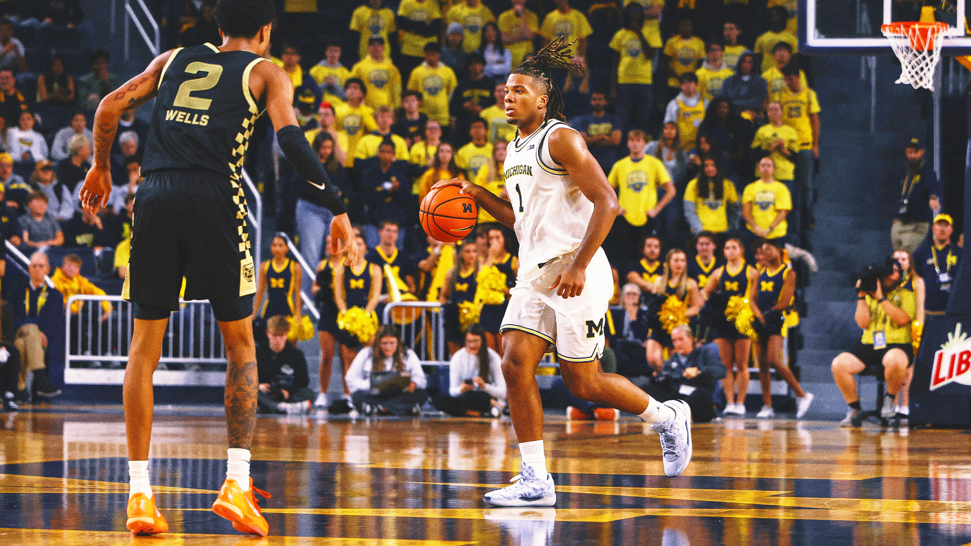 Last Night in College Basketball: Michigan Dominated (Even With The Lights Off)
