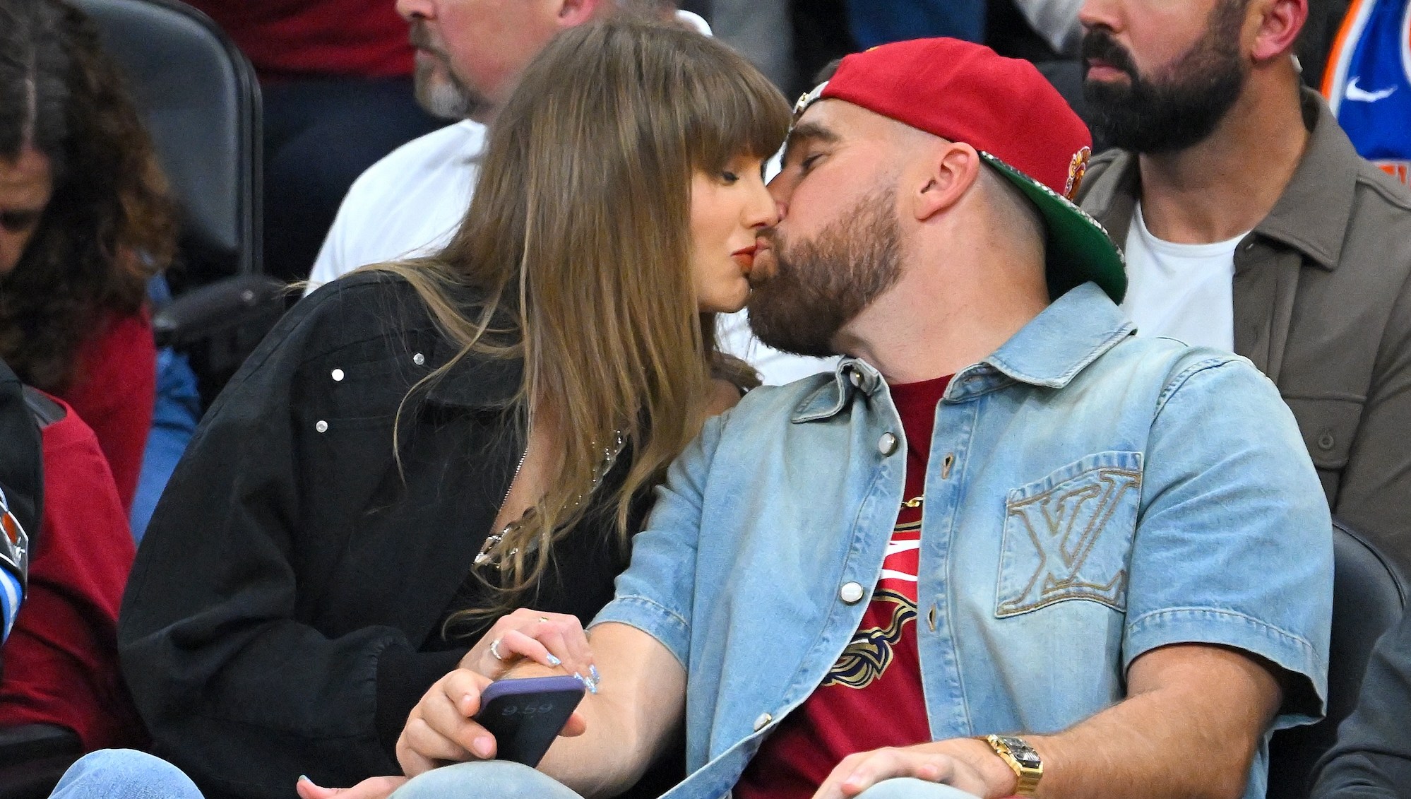 Travis Kelce Honors Taylor Swift With Romantic Movie Poster at L.A. Live Show