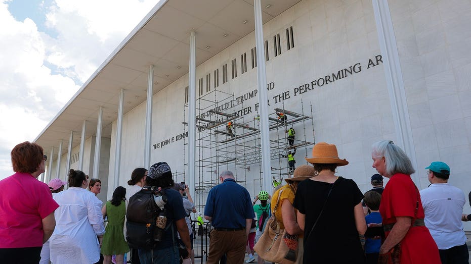Workers rip Trump's name from Kennedy center facade months after it goes on, hours after failed appeal