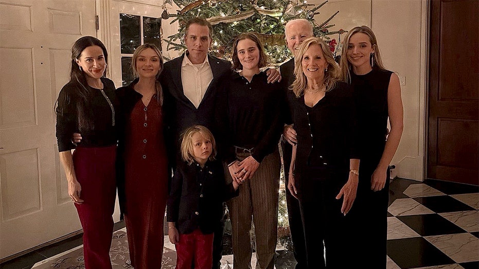 Biden nearly invisible in own Christmas family photo as Hunter takes center stage position